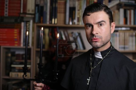 Photo for Close-up portrait of handsome young priest indoor - Royalty Free Image