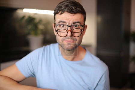 Man wearing three different types of eyeglasses simultaneously