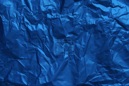 Photo for Blue crumpled texture background. Flat lay mockup design. Paper texture sheet abstract background, wrapping texture. - Royalty Free Image