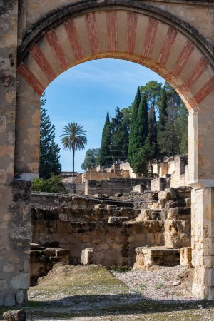 Photo for Door in a semicircular arch in the palatine city of Madinat Al-zahra, in Spanish Medina Azahara, archaeological site in Cordoba. - Royalty Free Image