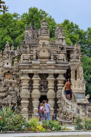 Photo for Hauterives, France - August 05, 2022 : The Postman Cheval s Ideal Palace is a unique architectural wonder located in Hauterives, built by a postman named Ferdinand Cheval over 33 years (1879-1912). - Royalty Free Image