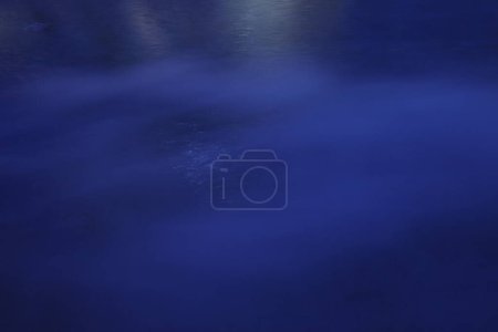 Fog over the water of a pool