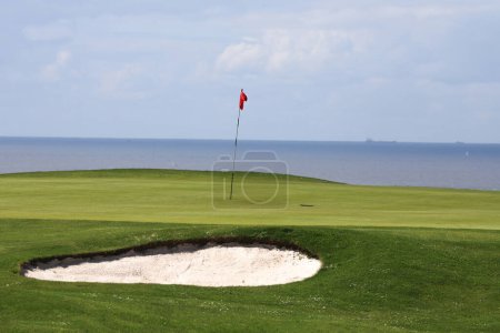 Photo for Golf course with bunker and nice  wiev on sea - Royalty Free Image