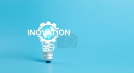 Photo for Technology innovation concept. Light bulbs with Innovation text icon blue background. Business learning inspiration creativity. network connection technology industrial. - Royalty Free Image