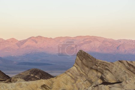 Photo for Scenery while sunrise in the Death Valley with rocks and desert in the west of the USA - Royalty Free Image