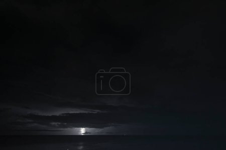 Photo for Nightshot: flashes of lightning in thunderstorm scenery around Curacao, the Caribbean. - Royalty Free Image