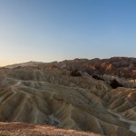 Scenery while sunrise in the Death Valley with rocks and desert in the west of the USA