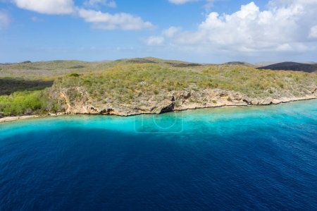 Photo for Aerial view of the coast of Curacao in the Caribbean with beach, cliff, and turquoise ocean - Royalty Free Image