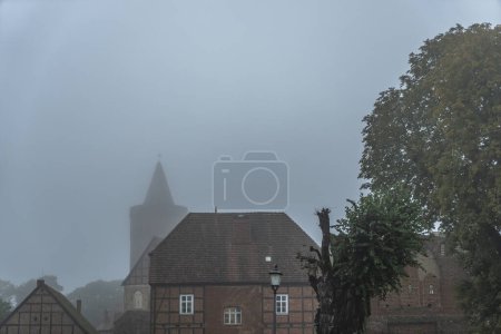 Photo for Foggy fall scenery around Burg Stargard, Germany - Royalty Free Image