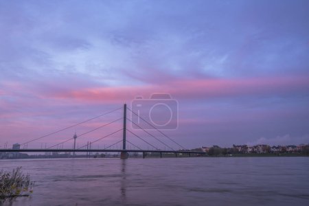 Photo for Fall sunset scenery at River Rhine, Dusseldorf, Germany - Royalty Free Image