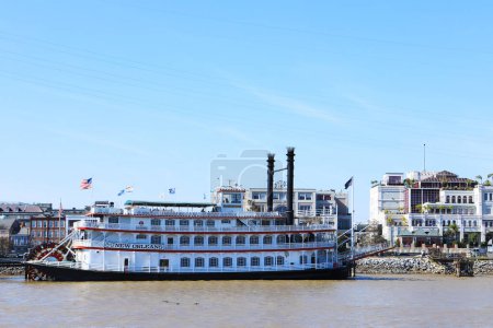 Photo for New Orleans, Louisiana, United States- February 9, 2023- A Riverboat docked by French quarter in New Orleans, Louisiana, United States - Royalty Free Image