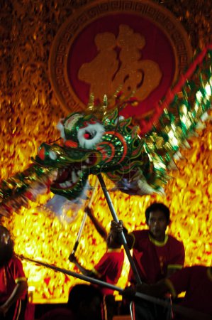 Photo for The Chinese community group celebrated Chinese New Year at the Empire Palace in Surabaya, East Java, Indonesia on February 13, 2002 - Royalty Free Image