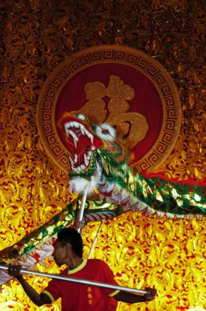Photo for The Chinese community group celebrated Chinese New Year at the Empire Palace in Surabaya, East Java, Indonesia on February 13, 2002 - Royalty Free Image