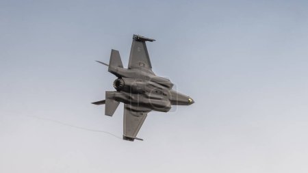 Photo for Fairford, UK - 14th July 2022: A Lockheed Martin F-35 Lightning 2 fighter jet, flying past low in height - Royalty Free Image