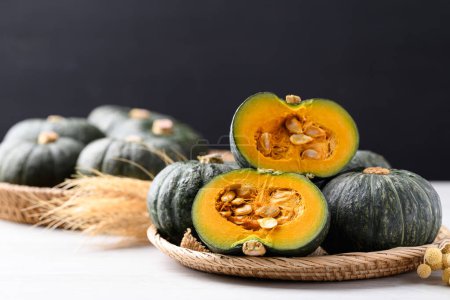 Green pumpkin or Japanese pumpkin in natural basket, Vegetable in autumn season