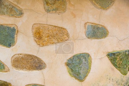 Photo for Stone wall as a background or texture. An example of masonry as a cladding of external walls. - Royalty Free Image