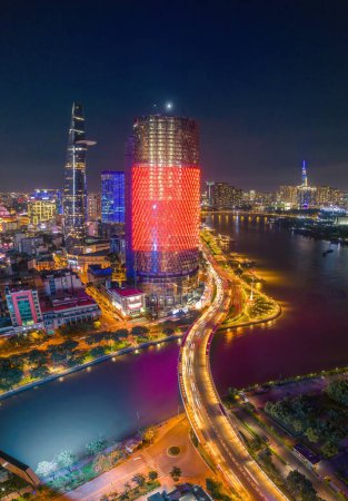 Photo for Ho Chi Minh city, Vietnam - 29 August 2022: Aerial view of Bitexco and IFC One Saigon Tower, buildings, roads, Thu Thiem 2 bridge and Saigon river - Far away is Landmark 81 skyscraper. - Royalty Free Image