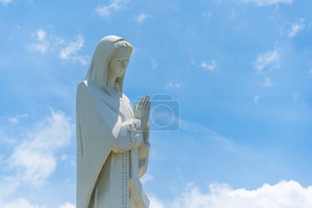 Photo for View of Our lady of Lourdes Virgin Mary catholic religious statue on a Nui Cui mountain in Dong Nai province, Vietnam. Travel and religion concept. - Royalty Free Image