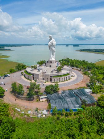Photo for Aerial view of Our lady of Lourdes Virgin Mary catholic religious statue on a Nui Cui mountain in Dong Nai province, Vietnam. Travel and religion concept. - Royalty Free Image