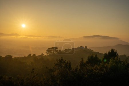 Fanciful scenery of an early morning when the sunset over the mountain range, Bao Loc district, Lam Dong province, Vietnam. Travel and landscape concept