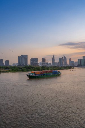 Photo for Ho Chi Minh city, Vietnam - 28 Feb 2024: view of Bitexco Tower, buildings, roads and Saigon river in Ho Chi Minh city - Saigon skyline. Beautiful night view cityscape. Travel concept. - Royalty Free Image