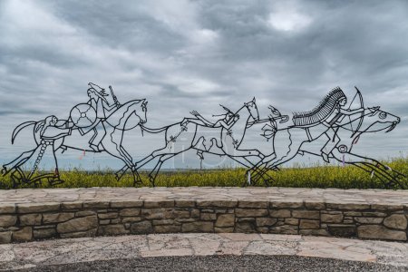Photo for Sculpture of Native Americans and horses in the the Indian Memorial at the Little Bighorn Battlefield - Royalty Free Image