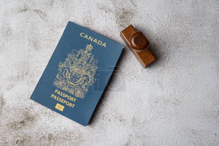 Photo for Canadian passport and stamp . Holiday and business travel concept - Royalty Free Image
