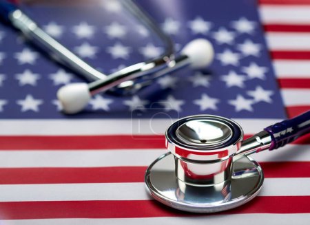 Photo for U.S. health care. Medical stethoscope on a U.S. flag. US health insurance concept - Royalty Free Image