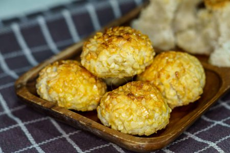 Photo for Panellets, a traditional sweet from Catalonia, Spain, prepared to be eaten on November 1, All Saints' Day. Sweet dough made with sugar, ground raw almonds, egg, sugar, sugared almonds, egg - Royalty Free Image