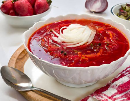 Mouth-watering Ukrainian borsch with sour cream and rye bread