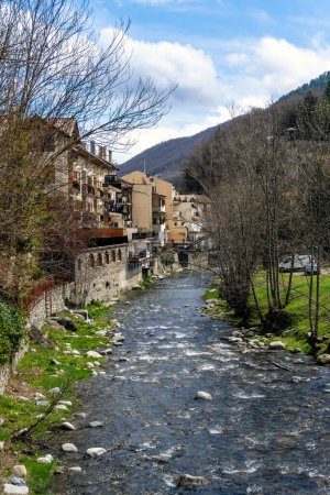 Photo for River Ter as it passes by the houses in the town of Camprodon in Girona, Spain. - Royalty Free Image