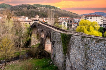 Photo for Sant Joan de les Abadesses, Catalonia, Spain. Old bridge, Pont Vell. - Royalty Free Image