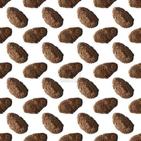 Belgian milk chocolate flakes truffles as seamless pattern background isolated top view