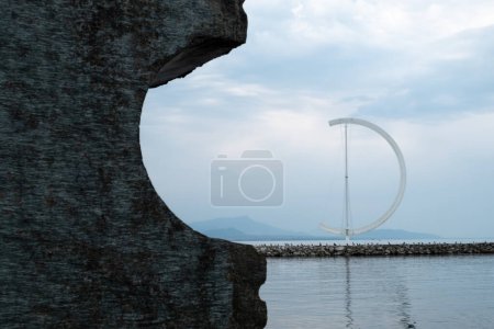Téléchargez les photos : L'Eole et les monolithes de pierre aident les plaisanciers à naviguer dans les eaux du lac Léman Port Ouchy - en image libre de droit