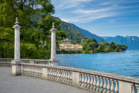 Photo for Villa Melzi viewed from the curved promenade at the gardens in Bellagio Italy - Royalty Free Image