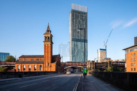 Photo for Panoramic view of Castle field Congregational Chapel with Beetham tower in background at Manchester UK - Royalty Free Image