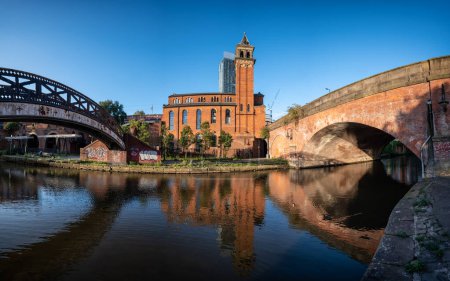 Photo for Deansgate, Castle field Congregational Chapel across Bridgewater canal  in Manchester UK - Royalty Free Image
