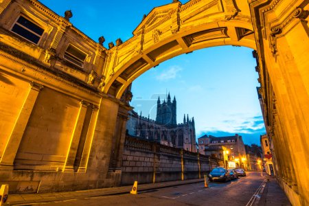 Photo for View of Bath Abbey through an arch way in UK - Royalty Free Image