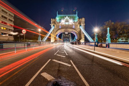 Photo for Light trails along Tower Bridge in London - Royalty Free Image