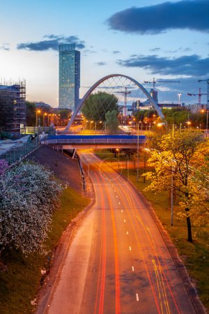 Photo for The Hulme Arch Bridge and Beetham Tower on a skyline of Manchester, England. - Royalty Free Image