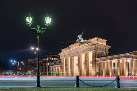 Photo for Berlin's most famous landmark, the Brandenburg Gate, at night, Germany - Royalty Free Image