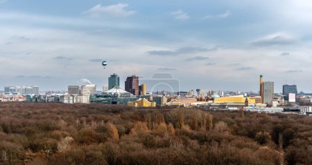Photo for Hot air balloon flying over Berlin skyline. - Royalty Free Image