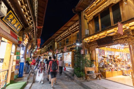 Photo for SHANGRI-LA, CHINA - SEP 5, 2023:Scenic old town street and ancient architecture building at Dukezong old town in Shangri-La, Yunnan, China. - Royalty Free Image