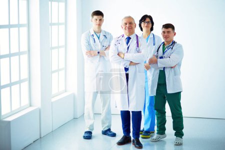 Photo for Successful medical team. Confident doctors team standing together and smiling. - Royalty Free Image