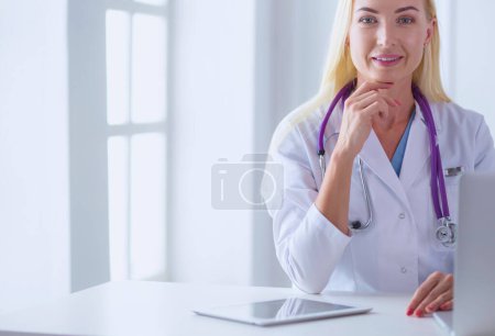 Photo for Portrait of a young female doctor in a medical office. - Royalty Free Image