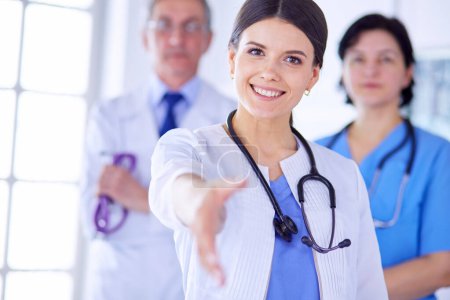 Photo for Doctor offering a handshake in the hospital - Royalty Free Image