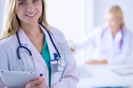 Photo for Woman doctor standing with stethoscope at hospital . Woman doctor. - Royalty Free Image