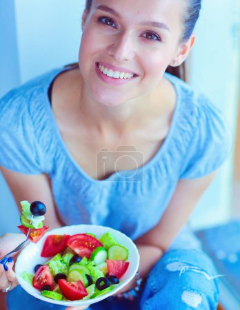 Photo for A beautiful girl eating healthy food. Beautiful girl. - Royalty Free Image