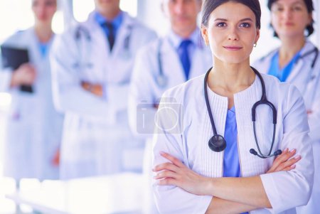 Photo for Group of doctors and nurses standing in the hospital room - Royalty Free Image