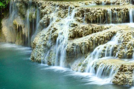 Krushuna waterfalls turquoise water terraces and pools, the biggest travertine cascade in Bulgaria